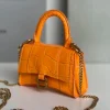 Balenciaga hourglass bag orange model: 169 size: 12104.5cm