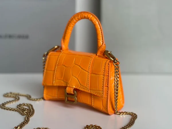 Balenciaga hourglass bag orange model: 169 size: 12104.5cm