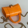 Balenciaga hourglass bag orange model: 169 size: 12104.5cm