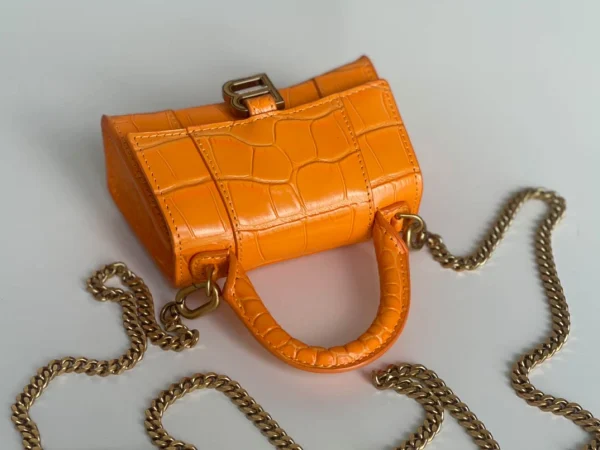 Balenciaga hourglass bag orange model: 169 size: 12104.5cm