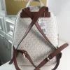 MK Rhea printed studded shoulder bag Model: 2106: Size: 26m Height: 32 Width: 14