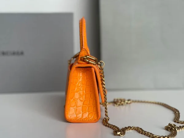 Balenciaga hourglass bag orange model: 169 size: 12104.5cm