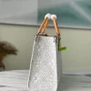 Louis Vuitton Size: 35 x 27 x 14 cm