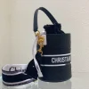 Black Cowhide Hollow Oblique Printed Bucket Bag Size 22cmx16cm