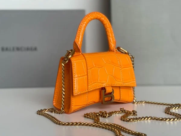 Balenciaga hourglass bag orange model: 169 size: 12104.5cm