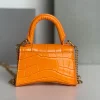 Balenciaga hourglass bag orange model: 169 size: 12104.5cm