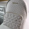 MK Rhea printed studded shoulder bag Model: 2106: Size: 26m Height: 32 Width: 14